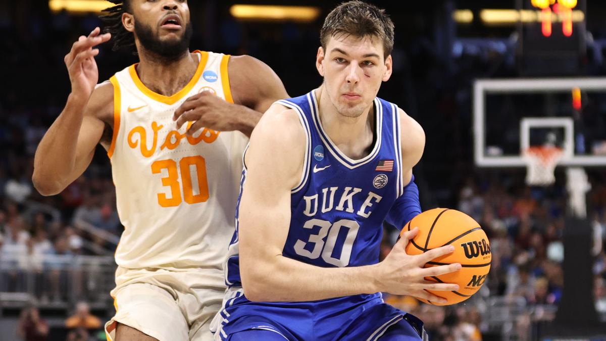 Duke Blue Devils center Kyle Filipowski drives against Tennessee